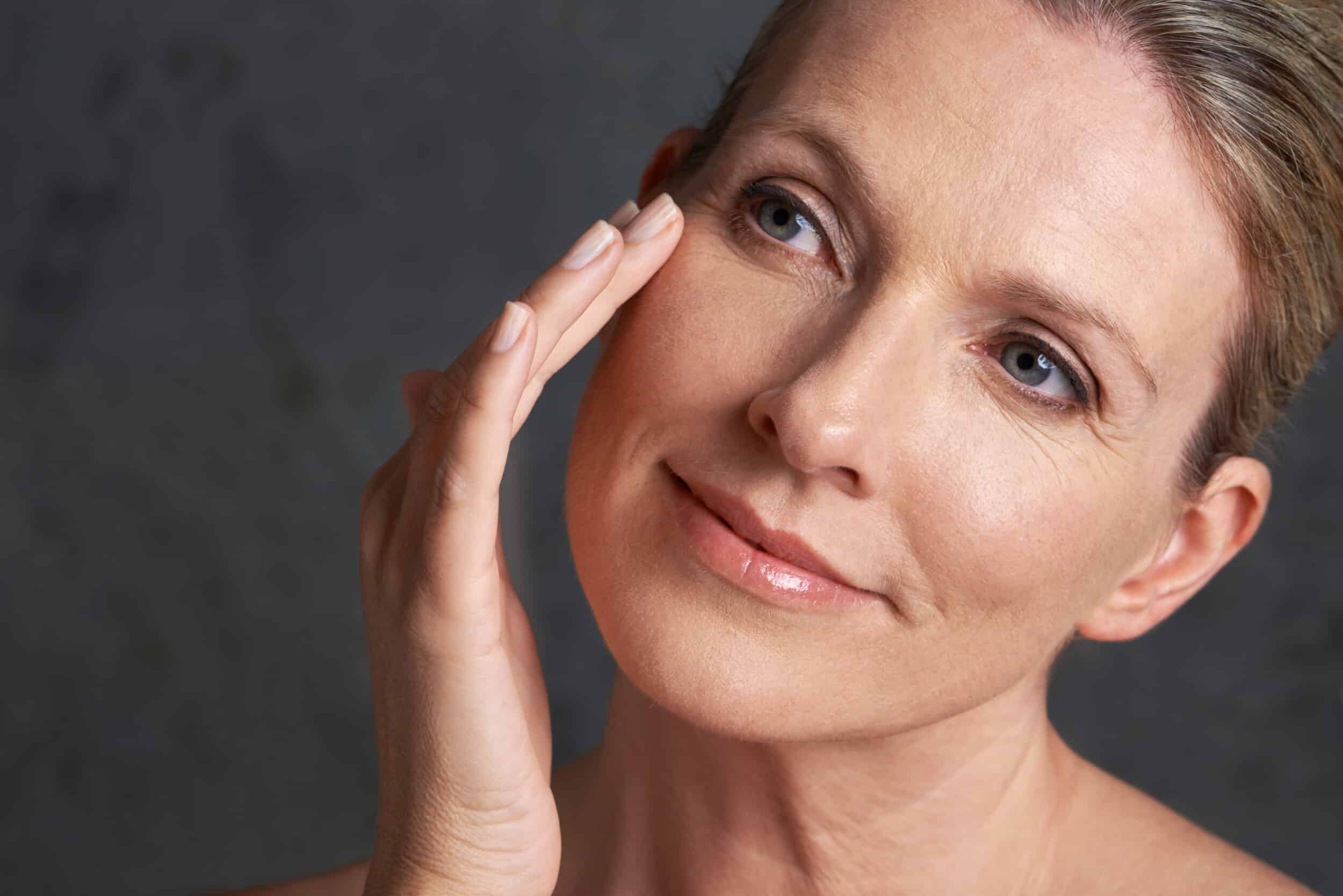 Mature woman with glowing skin after morpheus8 treatment